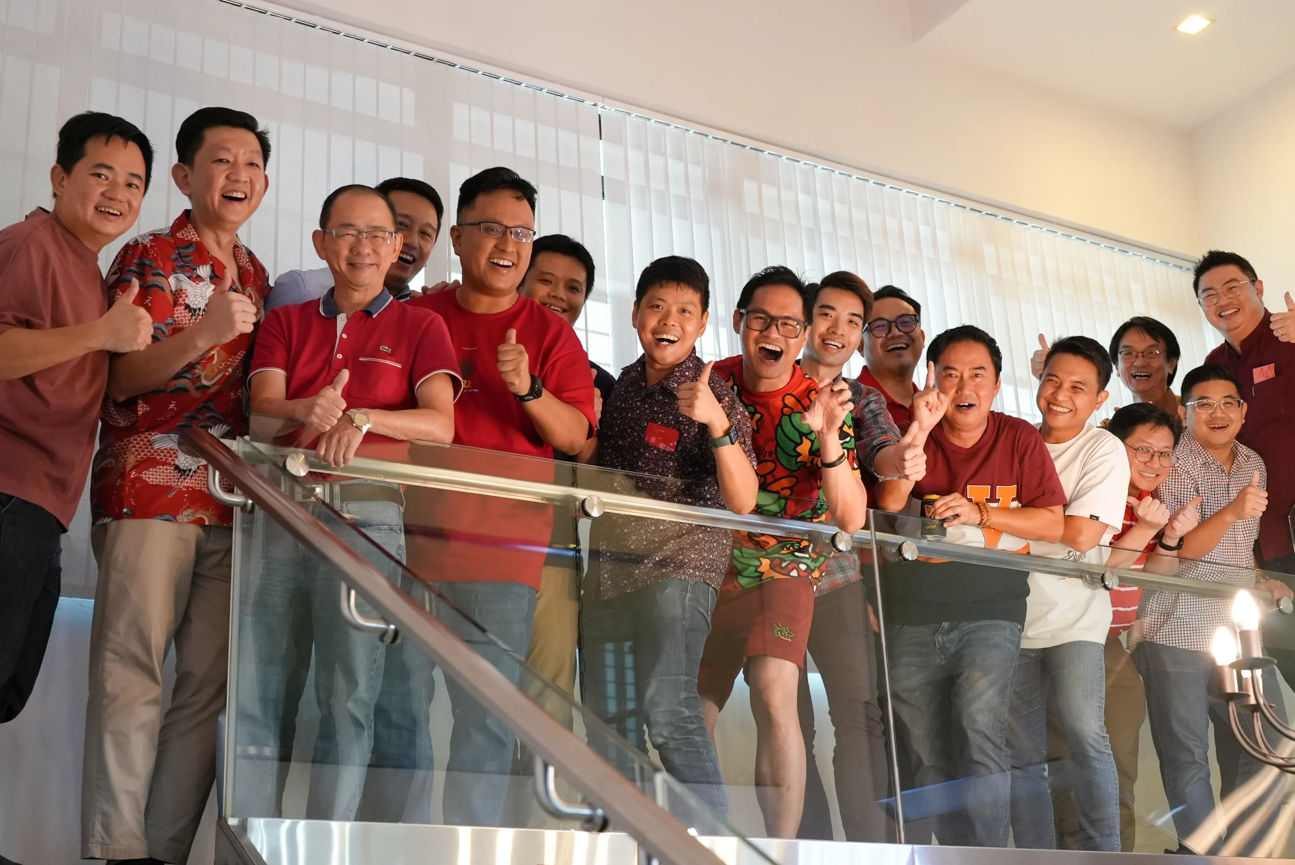 Group of financial advisors happily posing for a photo