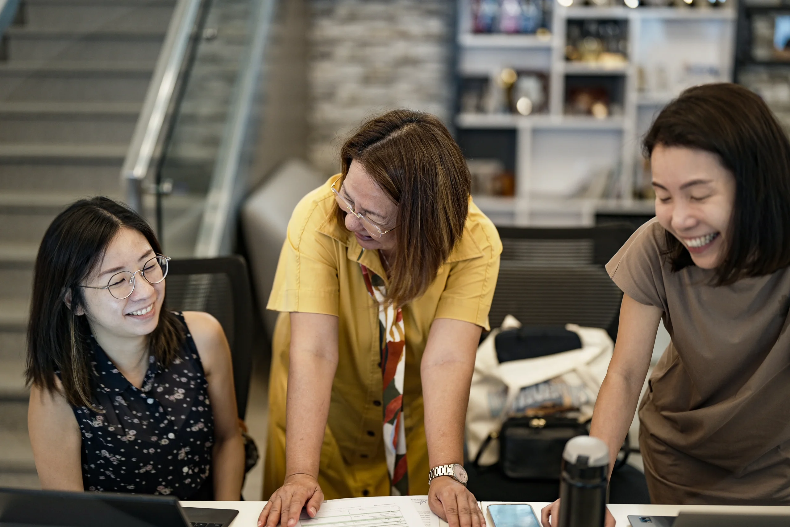 Advisors lauging during a friendly chat