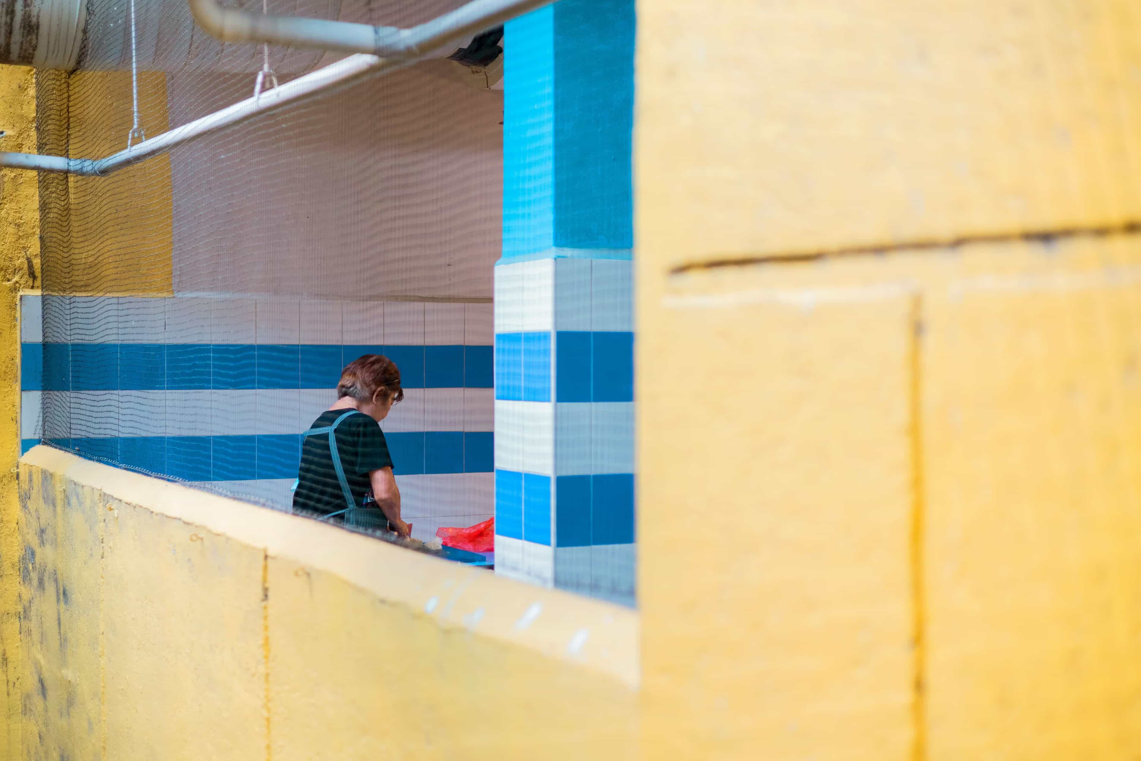 A child sitting in a corner