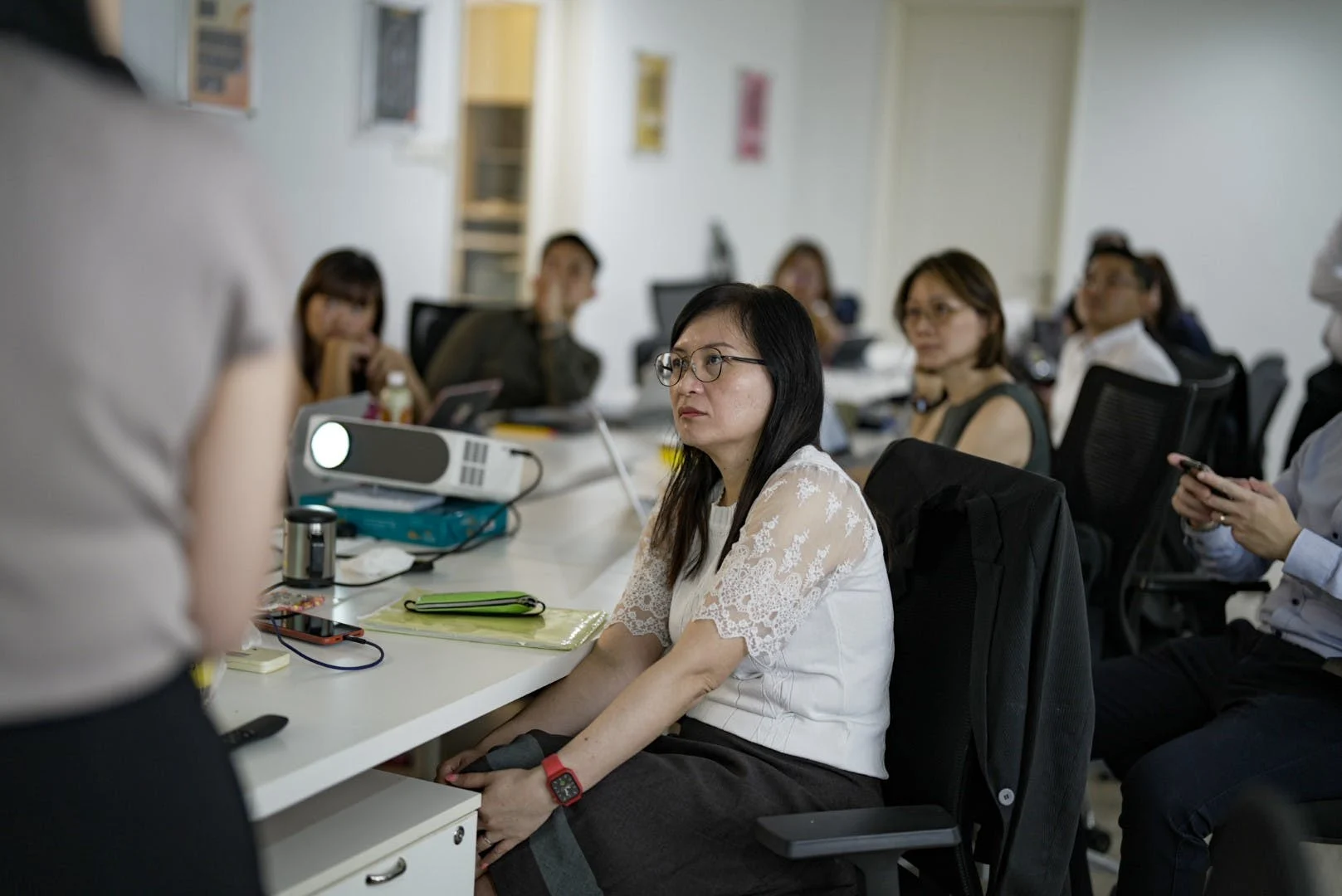 Advisors paying attention to speaker