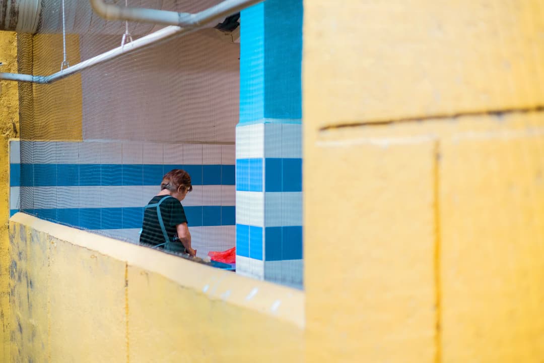 A child sitting in a corner